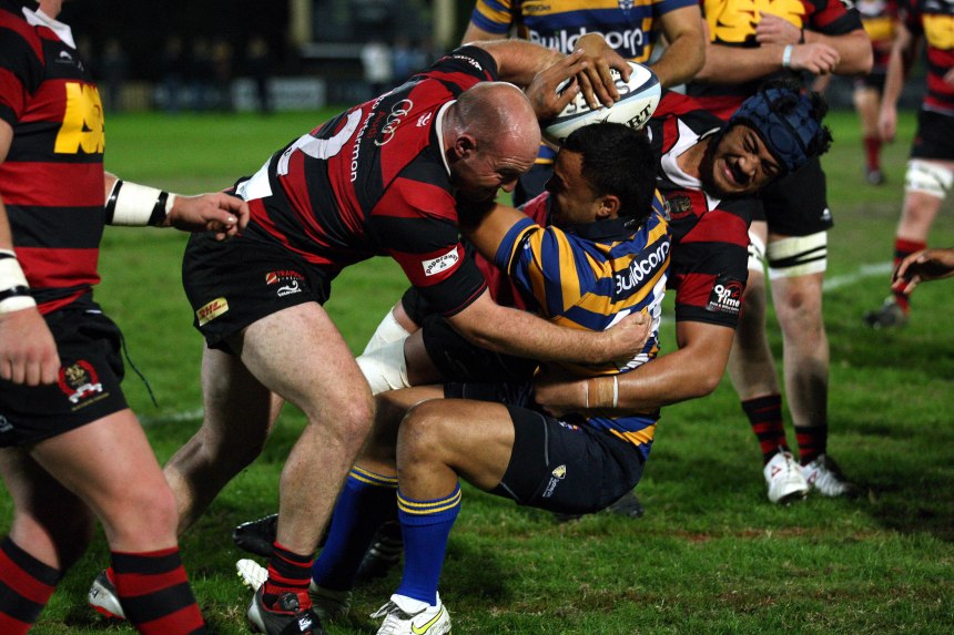 Dodd, Levi tackled- Podmore, SCott -Tafua, Seti tackling 060511D-4177.jpg