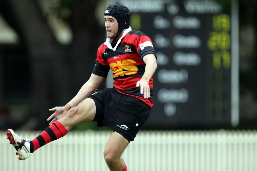 Smith, Pete kicking 240410D-1326.JPG